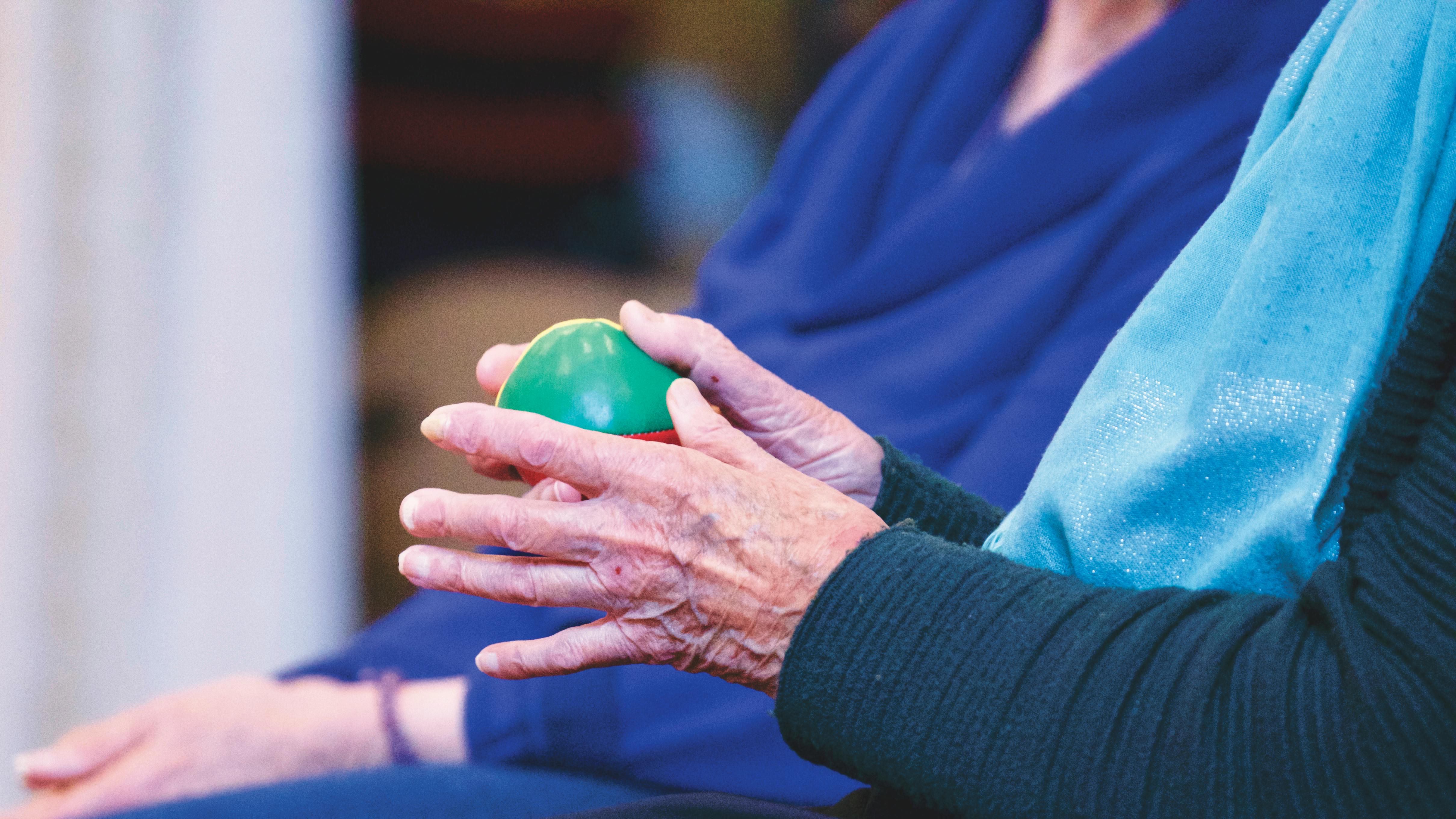Geriatric physiotherapy session with mobility and balance exercises for older adults